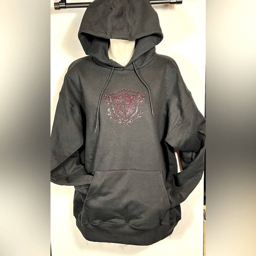 Oversized hoodie with detailed design.